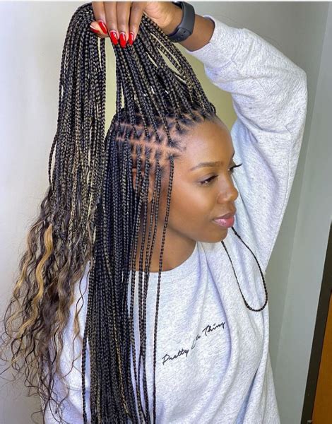 Your hair will be braided and wrapped with organic or fully synthetic Marley hair to create the look of locs. . Knotless braids near me
